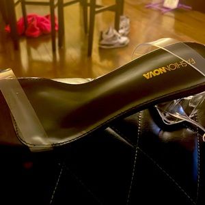 Clear and black heels